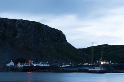 Scenic view of sea against sky at night