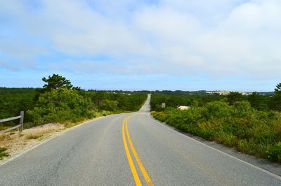 Empty country road along landscape