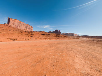 Rock formations in desert against sky