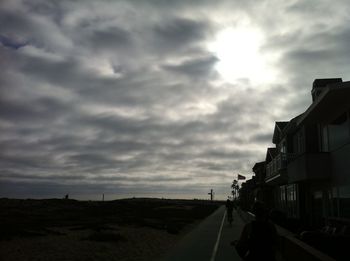 Road against cloudy sky