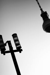 Low angle view of street light against sky