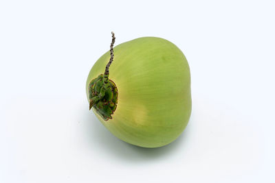 Close-up of apple against white background