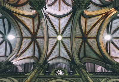 Low angle view of illuminated ceiling