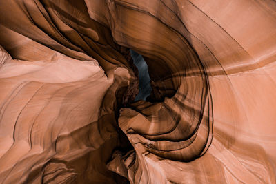 Midsection of person standing on rock