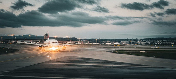 Airplane taxiing to the runway early morning