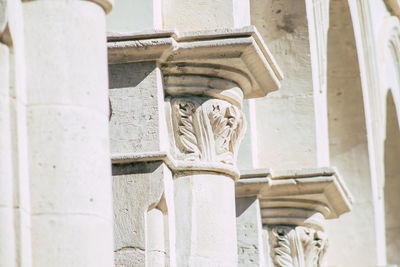 Low angle view of statue against building