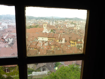 Cityscape seen through window