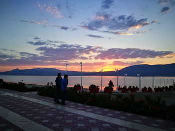 Scenic view of calm lake at sunset