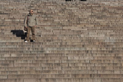Man standing on steps