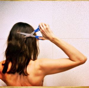 Woman with hands in water