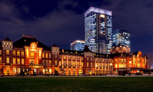 Illuminated buildings in city at night