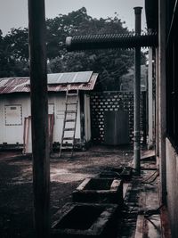 Exterior of old building by house