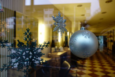 Close-up of illuminated christmas tree at home