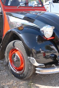 Close-up of vintage car on street