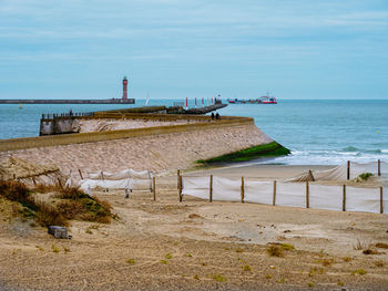 Scenic view of beach against sky