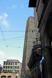 Low angle view of old buildings against sky
