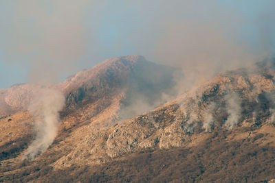 Panoramic view of volcanic mountain against sky