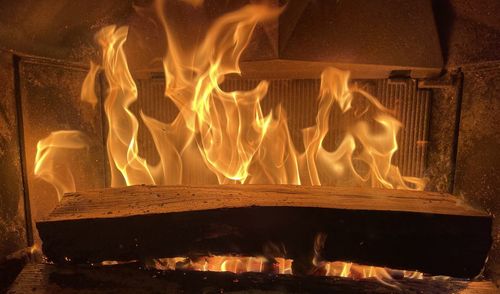 Close-up of burning fire at night