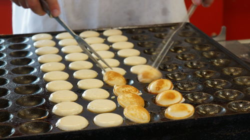 High angle view of person preparing food