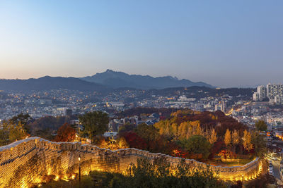 High angle view of townscape against sky during sunset