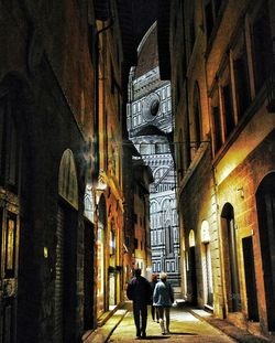 Low angle view of man standing in front of building