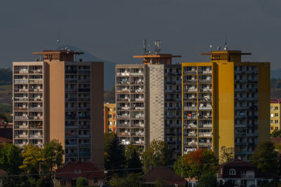 Exterior of buildings in city against sky