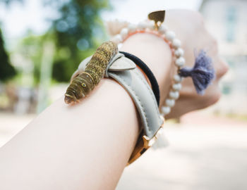 Low section of woman wearing canvas shoes