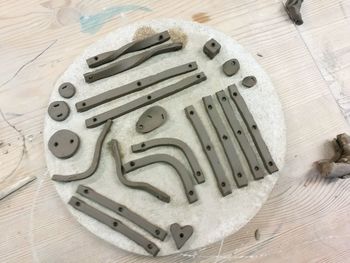 High angle view of piano on table