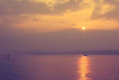 Scenic view of sea at sunset