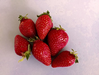 High angle view of strawberries on table