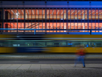 Blurred motion of train at railroad station