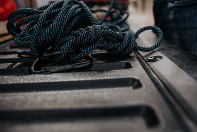 Close up of climbing ropes in knots on truck bed