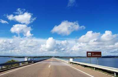 View of beach against cloudy sky