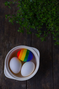 High angle view of candies in bowl on table