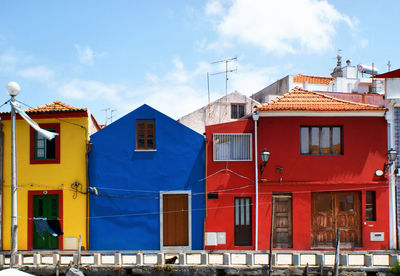 Buildings against blue sky