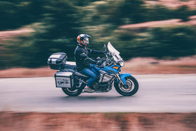 View of man riding motorcycle