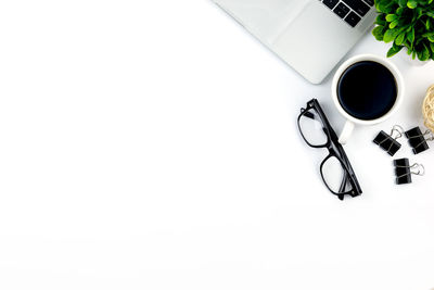 High angle view of coffee cup on table