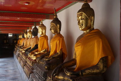 Sculpture of buddha statue outside temple