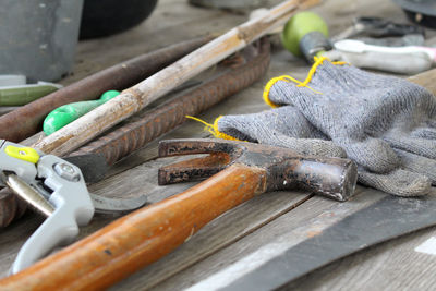 Close-up of hand working on table