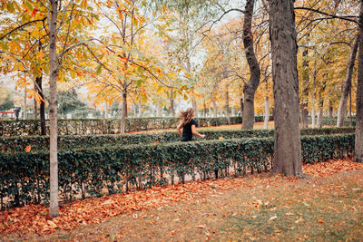Woman in park during autumn
