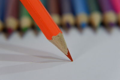 Close-up of colored pencils on table