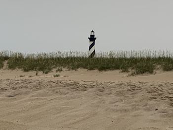 Side view of man walking on beach