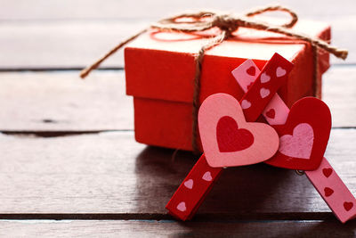 Close-up of gift on wooden table