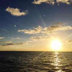 Scenic view of calm sea at sunset