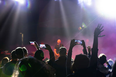 Group of people at music concert