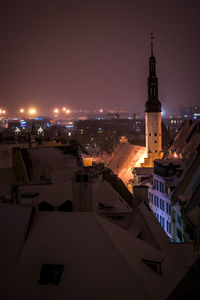 View of city lit up at night