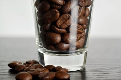 Close-up of coffee beans in glass