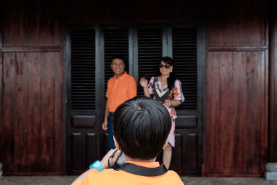 Woman with arms raised