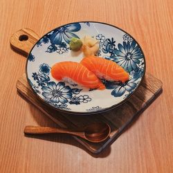 High angle view of fish in bowl on table