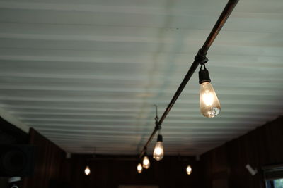 Low angle view of illuminated light bulb